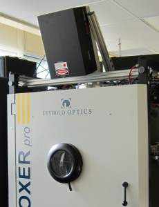 Leybold e-beam based coater tool equipped with kSA MOS system for real-time curvature and stress measurement. www.leyboldoptics.com